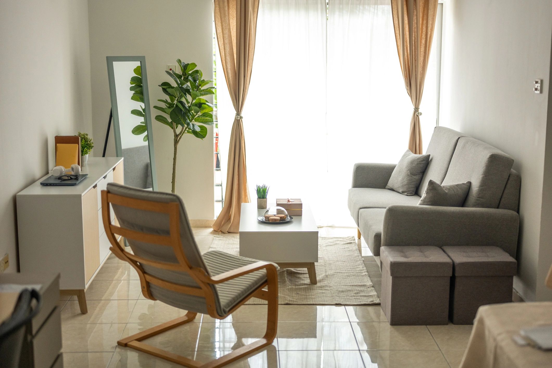 Luxury living room with layered furnishings and calm neutral palette